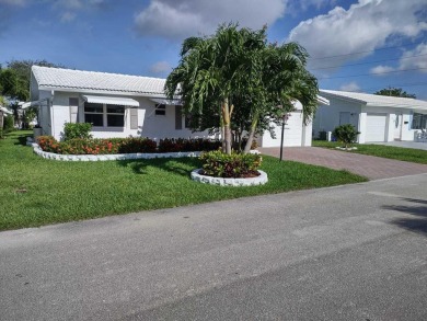 Welcome to this completely remodeled 3-bed, 2-bath home in a 55+ on Leisureville Community Golf Course in Florida - for sale on GolfHomes.com, golf home, golf lot