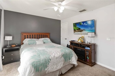 Welcome to this beautifully maintained 4-bedroom, 2-bathroom on Royal St. Cloud Golf Links in Florida - for sale on GolfHomes.com, golf home, golf lot