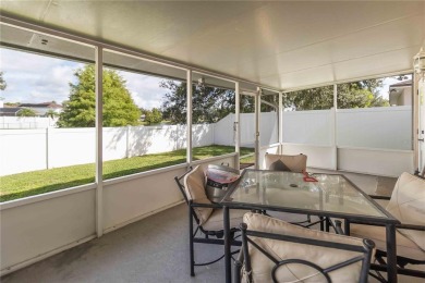 Welcome to this beautifully maintained 4-bedroom, 2-bathroom on Royal St. Cloud Golf Links in Florida - for sale on GolfHomes.com, golf home, golf lot