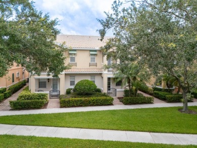 Welcome home to this beautiful end unit townhome in the heart of on Abacoa Golf Club in Florida - for sale on GolfHomes.com, golf home, golf lot