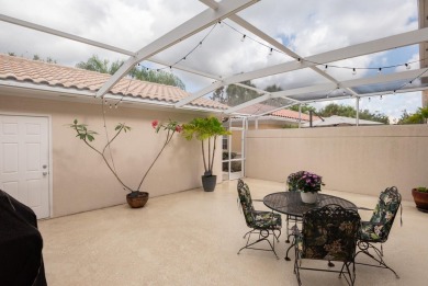 Welcome home to this beautiful end unit townhome in the heart of on Abacoa Golf Club in Florida - for sale on GolfHomes.com, golf home, golf lot
