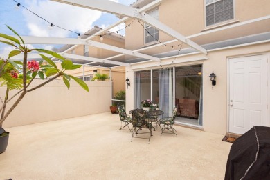 Welcome home to this beautiful end unit townhome in the heart of on Abacoa Golf Club in Florida - for sale on GolfHomes.com, golf home, golf lot