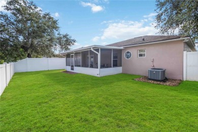Welcome to this beautifully maintained 4-bedroom, 2-bathroom on Royal St. Cloud Golf Links in Florida - for sale on GolfHomes.com, golf home, golf lot