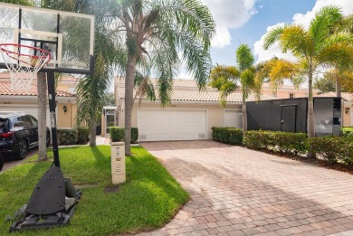 Welcome home to this beautiful end unit townhome in the heart of on Abacoa Golf Club in Florida - for sale on GolfHomes.com, golf home, golf lot