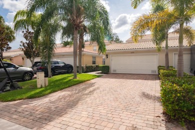 Welcome home to this beautiful end unit townhome in the heart of on Abacoa Golf Club in Florida - for sale on GolfHomes.com, golf home, golf lot