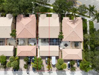 Welcome home to this beautiful end unit townhome in the heart of on Abacoa Golf Club in Florida - for sale on GolfHomes.com, golf home, golf lot