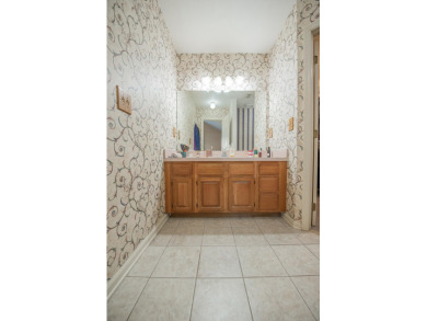 Welcome to this charming 3-bedroom, 2-bath home with an office on Killearn Country Club and Inn in Florida - for sale on GolfHomes.com, golf home, golf lot