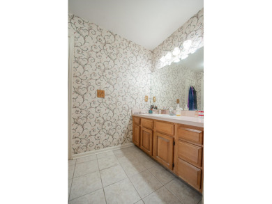 Welcome to this charming 3-bedroom, 2-bath home with an office on Killearn Country Club and Inn in Florida - for sale on GolfHomes.com, golf home, golf lot