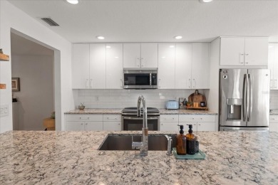Under contract-accepting backup offers. This gorgeous Coastal on East Lake Woodlands Country Club in Florida - for sale on GolfHomes.com, golf home, golf lot