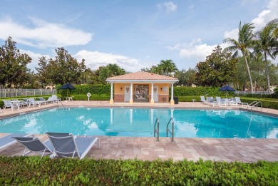 Welcome home to this beautiful end unit townhome in the heart of on Abacoa Golf Club in Florida - for sale on GolfHomes.com, golf home, golf lot