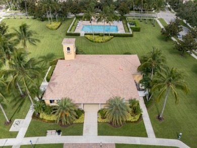 Welcome home to this beautiful end unit townhome in the heart of on Abacoa Golf Club in Florida - for sale on GolfHomes.com, golf home, golf lot