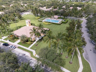 Welcome home to this beautiful end unit townhome in the heart of on Abacoa Golf Club in Florida - for sale on GolfHomes.com, golf home, golf lot