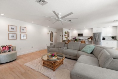 Under contract-accepting backup offers. This gorgeous Coastal on East Lake Woodlands Country Club in Florida - for sale on GolfHomes.com, golf home, golf lot
