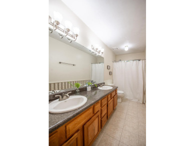 Welcome to this charming 3-bedroom, 2-bath home with an office on Killearn Country Club and Inn in Florida - for sale on GolfHomes.com, golf home, golf lot