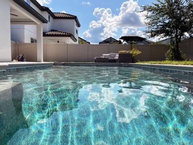 Immaculate 4/3 POOL HOME on a premium lot in highly sought after on Orange County National Golf Center and Lodge in Florida - for sale on GolfHomes.com, golf home, golf lot