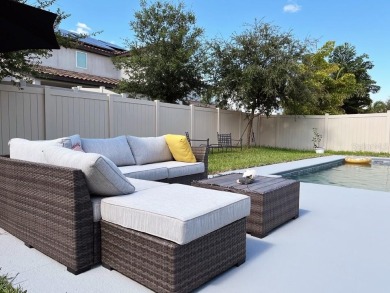 Immaculate 4/3 POOL HOME on a premium lot in highly sought after on Orange County National Golf Center and Lodge in Florida - for sale on GolfHomes.com, golf home, golf lot