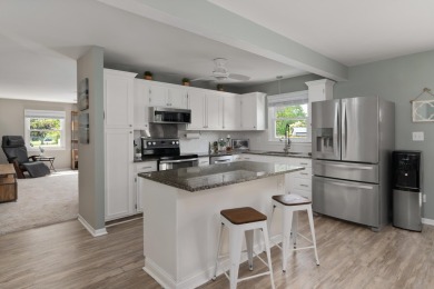 Welcome to this beautifully updated 3-bedroom, 2-bath brick on Thorn Apple Country Club in Ohio - for sale on GolfHomes.com, golf home, golf lot