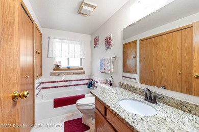 Tucked back on a secluded 1 acre lot sits this 3 bedroom 3 bath on Star Valley RV Golf Course in Wyoming - for sale on GolfHomes.com, golf home, golf lot