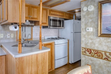 Discover cozy comfort in this beautifully maintained 1-bedroom on Beaver Dam Resort in Arizona - for sale on GolfHomes.com, golf home, golf lot