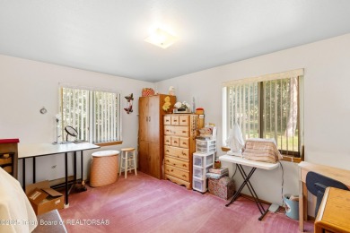 Tucked back on a secluded 1 acre lot sits this 3 bedroom 3 bath on Star Valley RV Golf Course in Wyoming - for sale on GolfHomes.com, golf home, golf lot