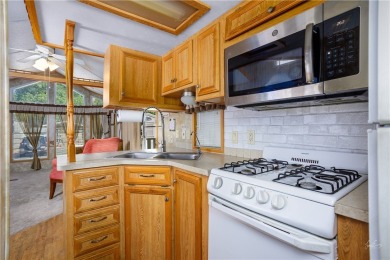 Discover cozy comfort in this beautifully maintained 1-bedroom on Beaver Dam Resort in Arizona - for sale on GolfHomes.com, golf home, golf lot