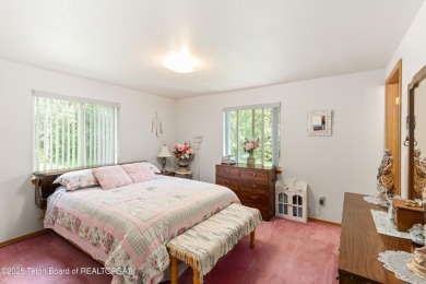 Tucked back on a secluded 1 acre lot sits this 3 bedroom 3 bath on Star Valley RV Golf Course in Wyoming - for sale on GolfHomes.com, golf home, golf lot