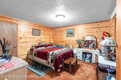 Tucked back on a secluded 1 acre lot sits this 3 bedroom 3 bath on Star Valley RV Golf Course in Wyoming - for sale on GolfHomes.com, golf home, golf lot