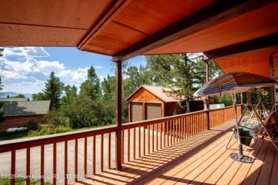 Tucked back on a secluded 1 acre lot sits this 3 bedroom 3 bath on Star Valley RV Golf Course in Wyoming - for sale on GolfHomes.com, golf home, golf lot