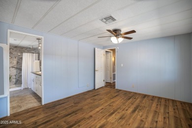 Enjoy comfortable and affordable living in the heart of Sun on Sun Lakes Country Club in Arizona - for sale on GolfHomes.com, golf home, golf lot