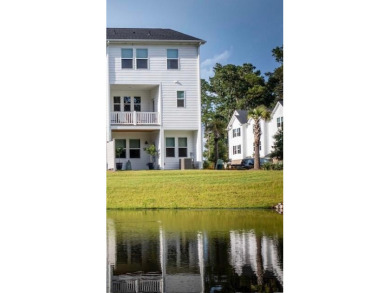Discover this beautifully appointed three-story townhome on Golf Club At Wescott Plantation in South Carolina - for sale on GolfHomes.com, golf home, golf lot