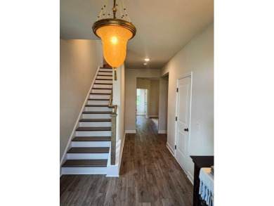 Discover this beautifully appointed three-story townhome on Golf Club At Wescott Plantation in South Carolina - for sale on GolfHomes.com, golf home, golf lot