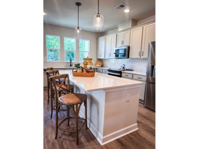 Discover this beautifully appointed three-story townhome on Golf Club At Wescott Plantation in South Carolina - for sale on GolfHomes.com, golf home, golf lot