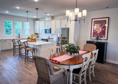 Discover this beautifully appointed three-story townhome on Golf Club At Wescott Plantation in South Carolina - for sale on GolfHomes.com, golf home, golf lot