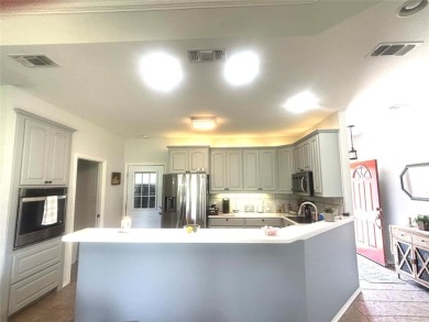 Beautiful townhome located on Hole #11 Green of Holiday Hills on Holiday Hills Country Club in Texas - for sale on GolfHomes.com, golf home, golf lot
