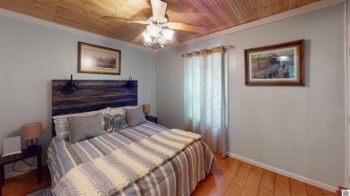 This inviting Lake Barkley Waterfront home with an easy walk to on Boots Randolph Golf Course in Kentucky - for sale on GolfHomes.com, golf home, golf lot