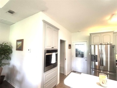 Beautiful townhome located on Hole #11 Green of Holiday Hills on Holiday Hills Country Club in Texas - for sale on GolfHomes.com, golf home, golf lot