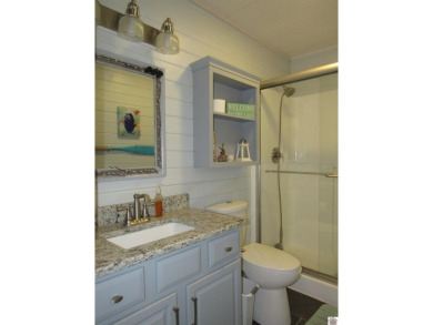 This inviting Lake Barkley Waterfront home with an easy walk to on Boots Randolph Golf Course in Kentucky - for sale on GolfHomes.com, golf home, golf lot