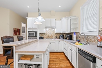 Absolutely stunning home located in the gated Eagles Landing on Eagles Landing Country Club in Georgia - for sale on GolfHomes.com, golf home, golf lot