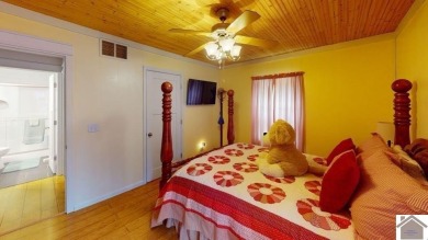 This inviting Lake Barkley Waterfront home with an easy walk to on Boots Randolph Golf Course in Kentucky - for sale on GolfHomes.com, golf home, golf lot