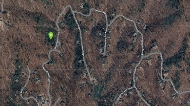 Almost a one acre lot to build your dream home. Big Canoe offers on Big Canoe Golf Club - Cherokee in Georgia - for sale on GolfHomes.com, golf home, golf lot