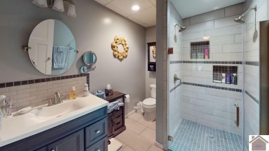This inviting Lake Barkley Waterfront home with an easy walk to on Boots Randolph Golf Course in Kentucky - for sale on GolfHomes.com, golf home, golf lot