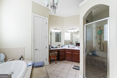 Absolutely stunning home located in the gated Eagles Landing on Eagles Landing Country Club in Georgia - for sale on GolfHomes.com, golf home, golf lot