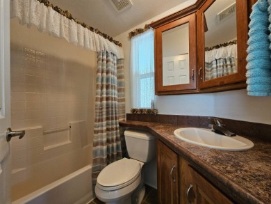 This charming 2-bedroom, 2-bathroom home features a new roof on Viewpoint Golf Resort in Arizona - for sale on GolfHomes.com, golf home, golf lot