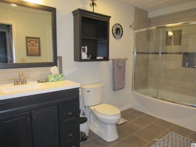 This inviting Lake Barkley Waterfront home with an easy walk to on Boots Randolph Golf Course in Kentucky - for sale on GolfHomes.com, golf home, golf lot