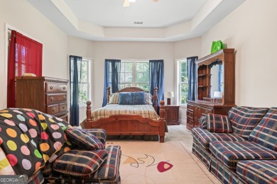 Absolutely stunning home located in the gated Eagles Landing on Eagles Landing Country Club in Georgia - for sale on GolfHomes.com, golf home, golf lot