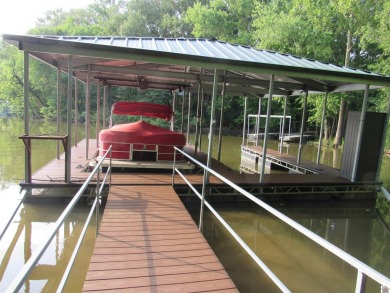 This inviting Lake Barkley Waterfront home with an easy walk to on Boots Randolph Golf Course in Kentucky - for sale on GolfHomes.com, golf home, golf lot