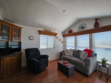 This charming 2-bedroom, 2-bathroom home features a new roof on Viewpoint Golf Resort in Arizona - for sale on GolfHomes.com, golf home, golf lot