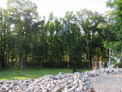 This inviting Lake Barkley Waterfront home with an easy walk to on Boots Randolph Golf Course in Kentucky - for sale on GolfHomes.com, golf home, golf lot