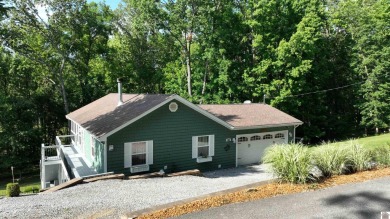 This inviting Lake Barkley Waterfront home with an easy walk to on Boots Randolph Golf Course in Kentucky - for sale on GolfHomes.com, golf home, golf lot