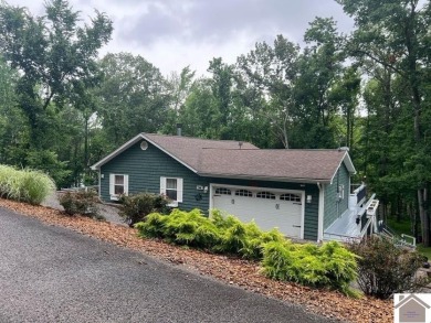 This inviting Lake Barkley Waterfront home with an easy walk to on Boots Randolph Golf Course in Kentucky - for sale on GolfHomes.com, golf home, golf lot